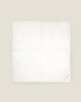 folded white goose down duvet
