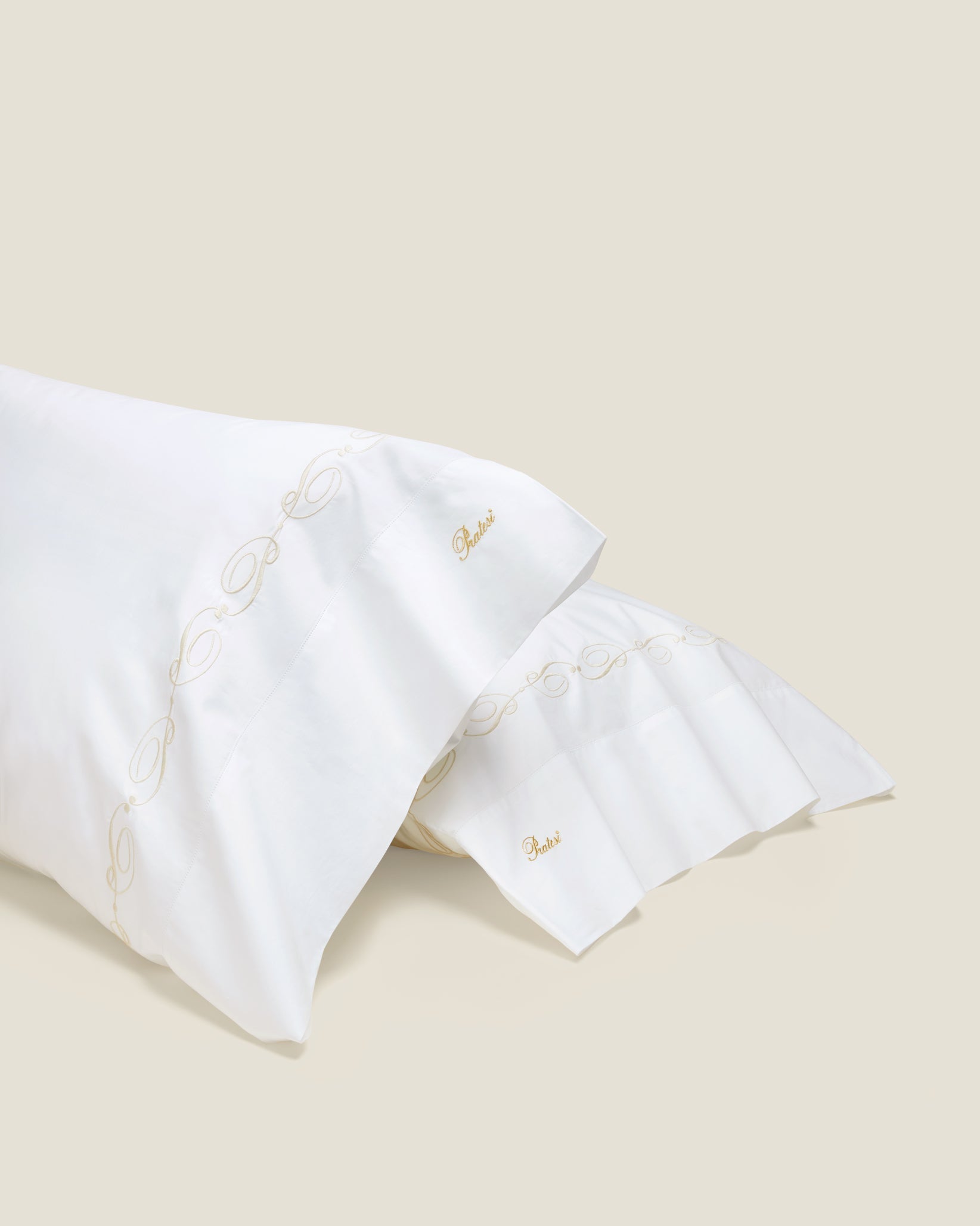 Icona pillowcase pair in white/beige