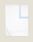 Tre Righe duvet cover in white/medium blue folded