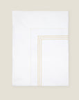 Tre Righe flat sheet white/beige folded.