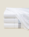 Tre Righe Flat sheet stack in white/white, white/medium blue, white/charcoal.