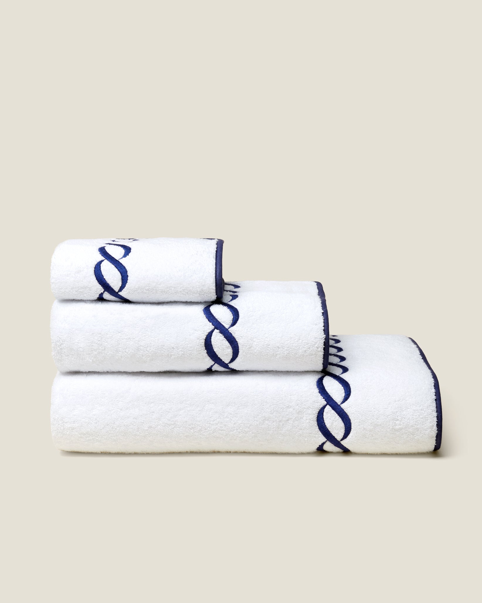 Treccia moderno white/navy towel stack