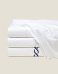 Treccia Moderno Flat sheets stacked in white/white, white/sterling and white/navy