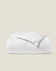 folded white goose down duvet