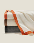 Dolomiti throw stack ivory/orange, ivory/beige & charcoal/sterling