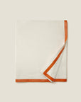 Ivory/orange dolomiti throw blanket