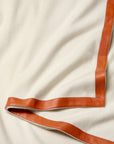 Ivory/orange dolomiti throw texture
