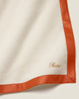 Ivory/Orange dolomiti throw corner
