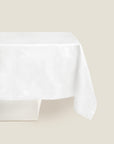 white tablecloth with braid motif pattern