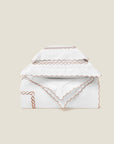 Treccia Splendore duvet cover stack in white/rose gold