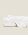 Treccia Splendore flat sheet in white/white and white/rose gold stack