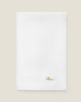 Bianchissimia white linen tablecloth folded