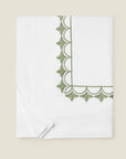 Arcata white/clover duvet cover folded.