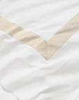 Tubo white/beige bed linens close up texture