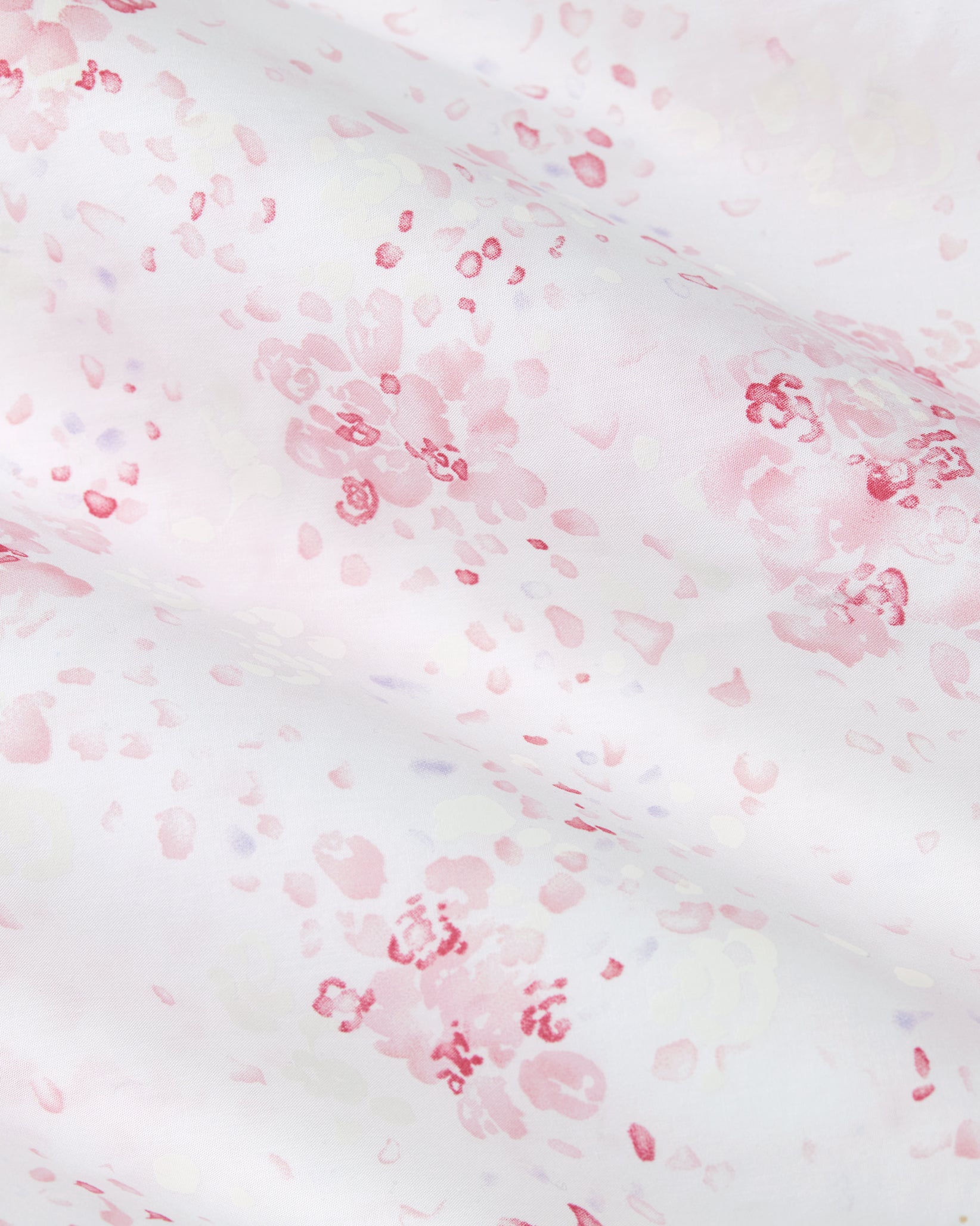 White fabric with pink floral patterns
