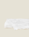 Impero Jacquard white flat sheet folded