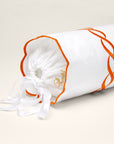 Treccia white/orange neckroll sham