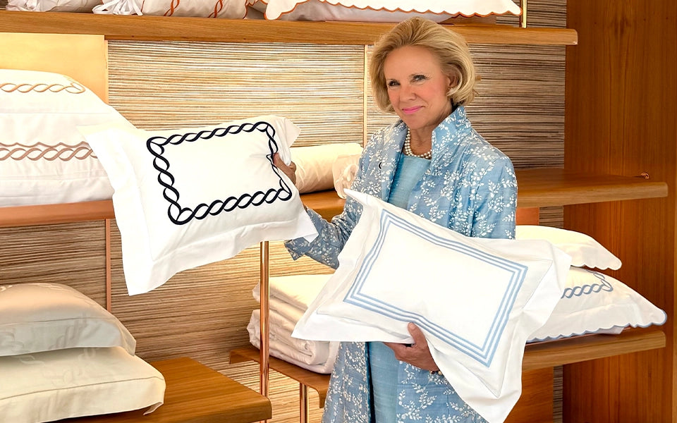 Holly Holden in pratesi store with Treccia Moderno and Tre Righe shams