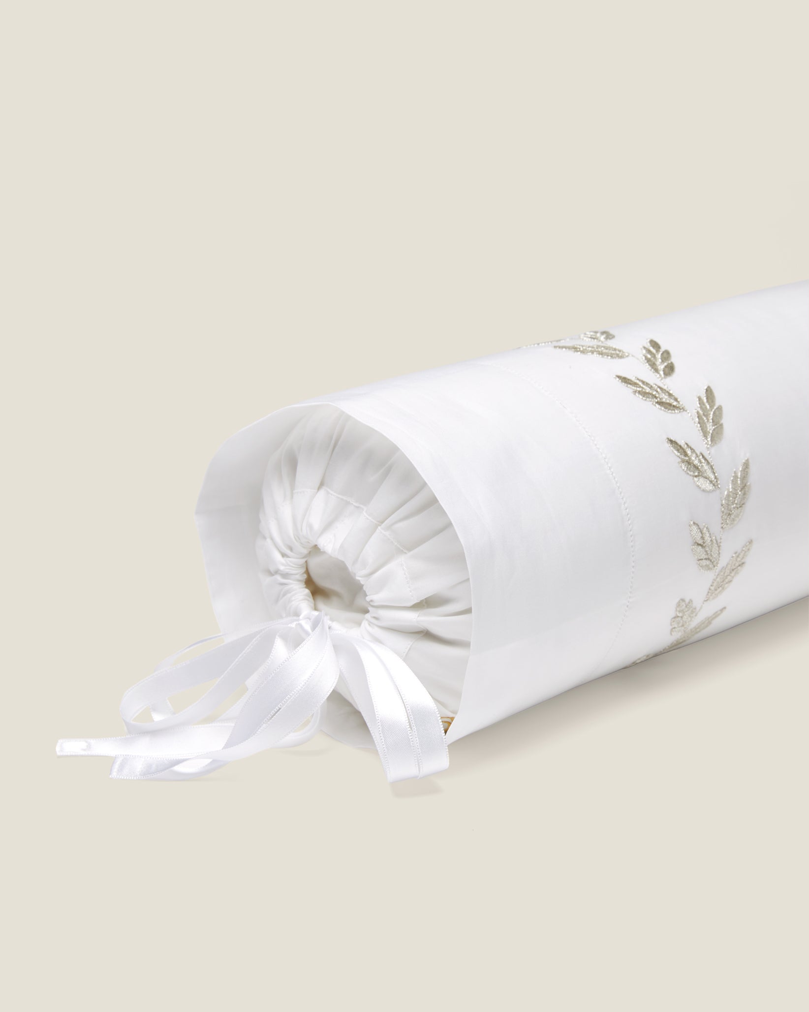 Federico white/antique silver neckroll sham