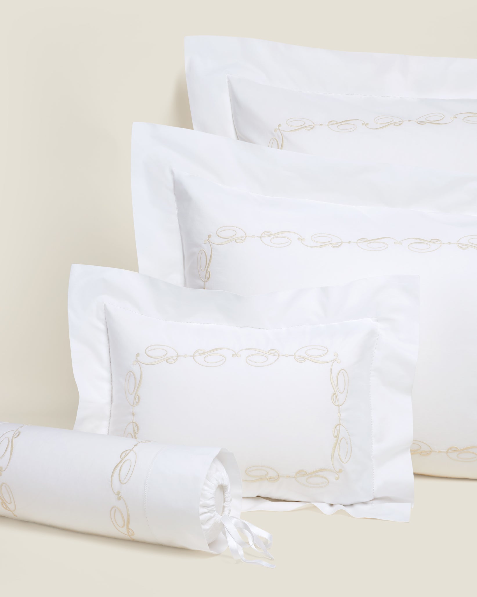 Icona queen, standard, boudoir and neckroll sham in white/beige