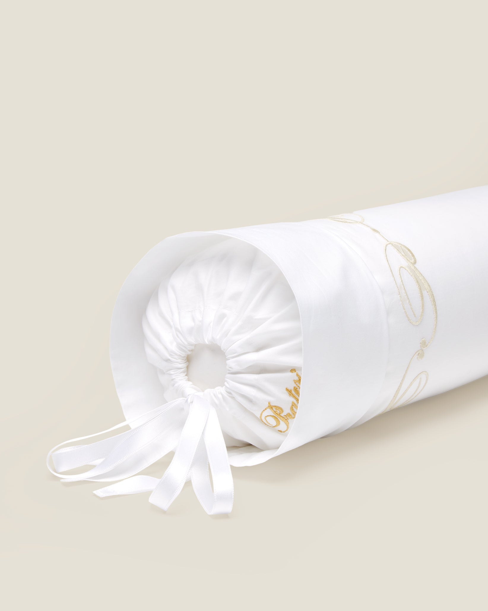 Icona neckroll sham in white/beige