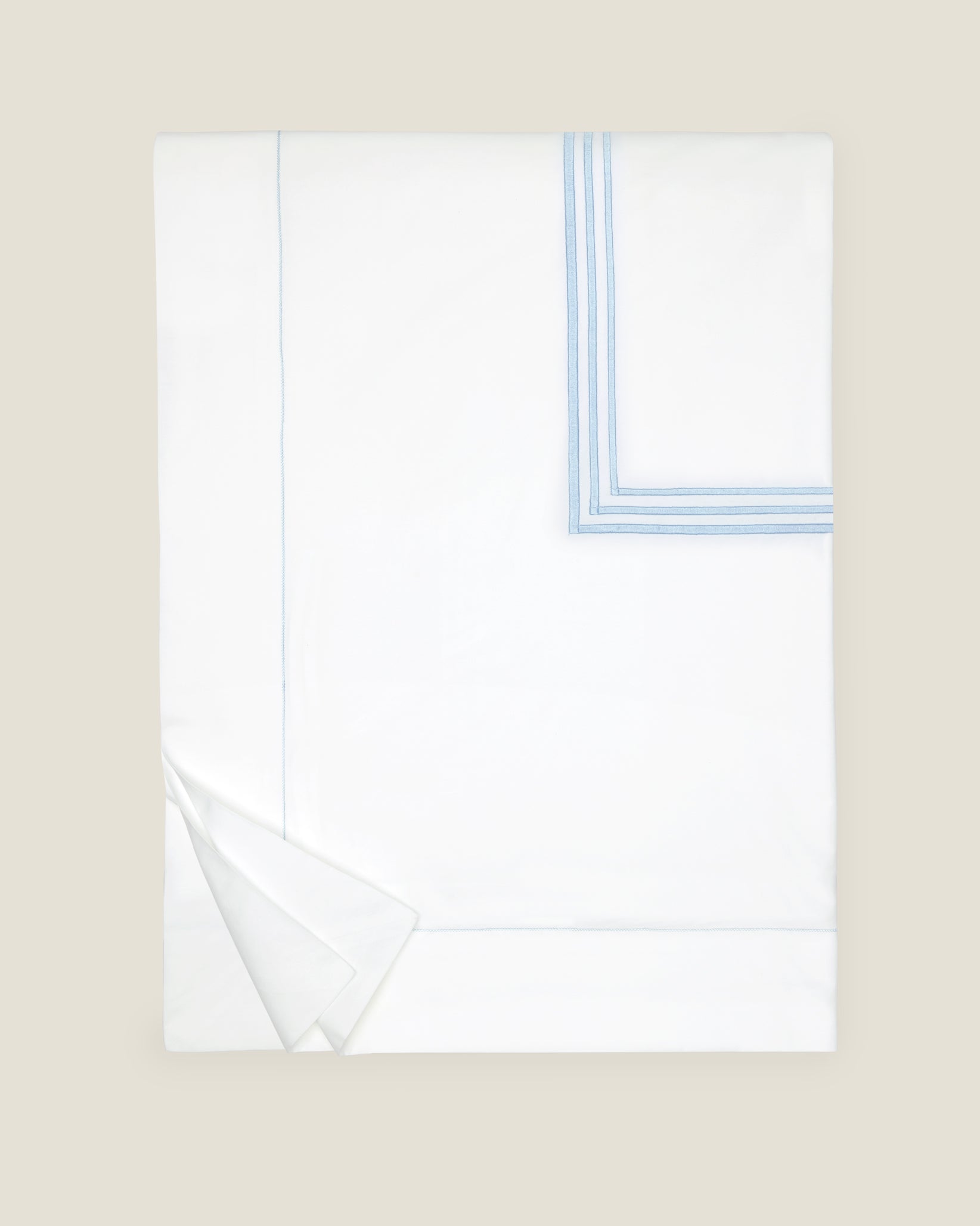 Tre Righe duvet cover in white/medium blue folded