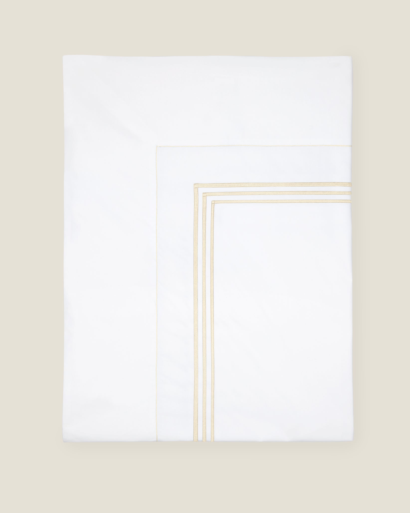 Tre Righe flat sheet white/beige folded.