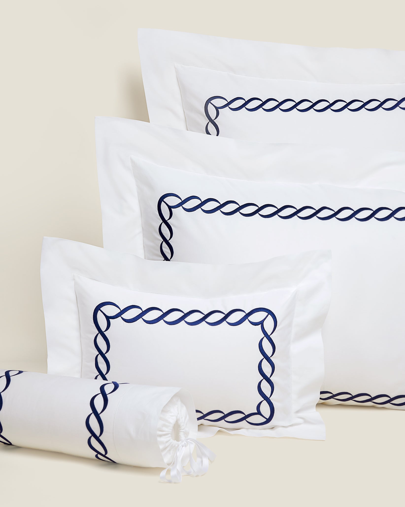 Treccia Moderno queen, standard, boudoir and neckroll sham in white/navy