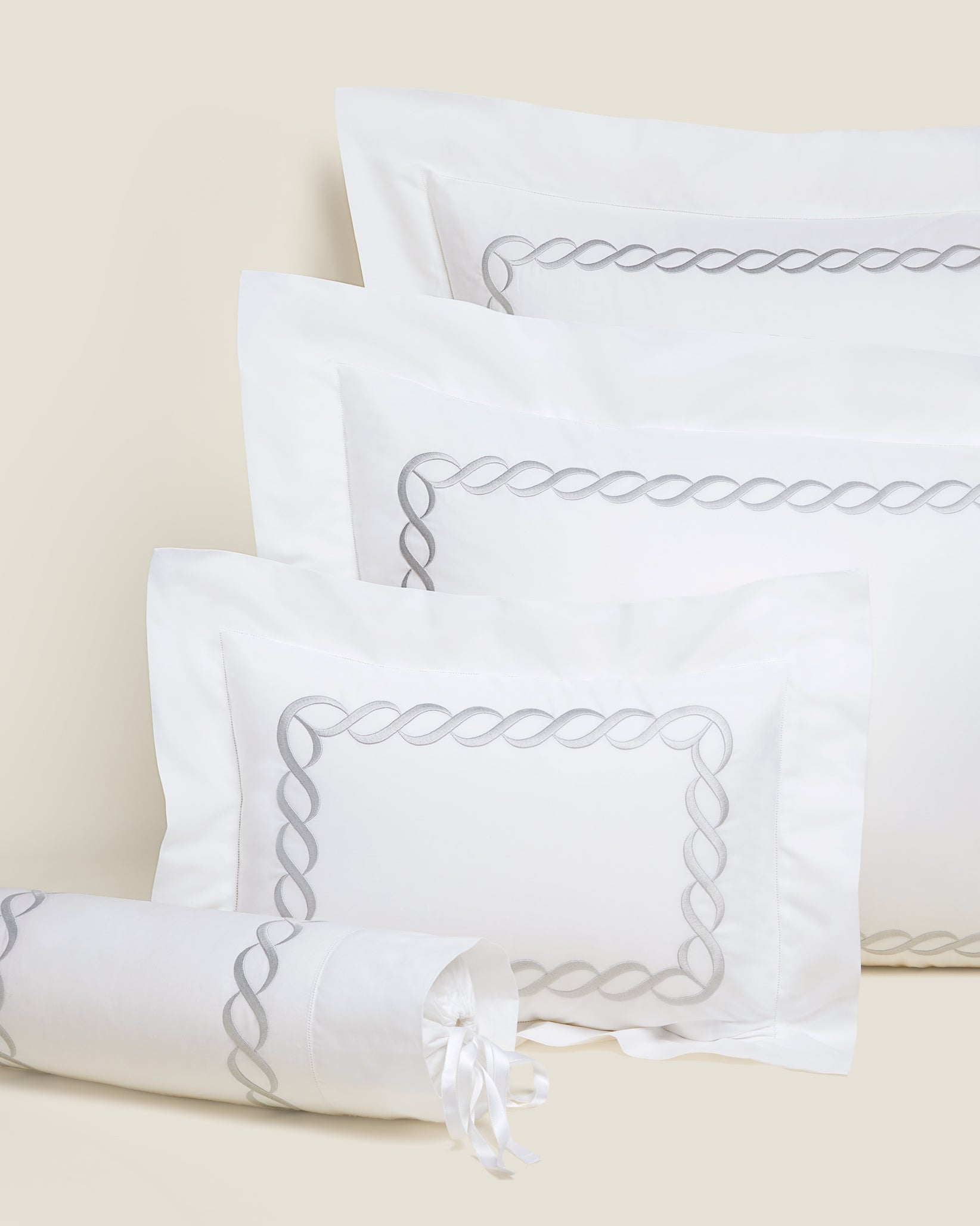 Treccia Moderno queen, standard, boudoir and neckroll sham in white/sterling