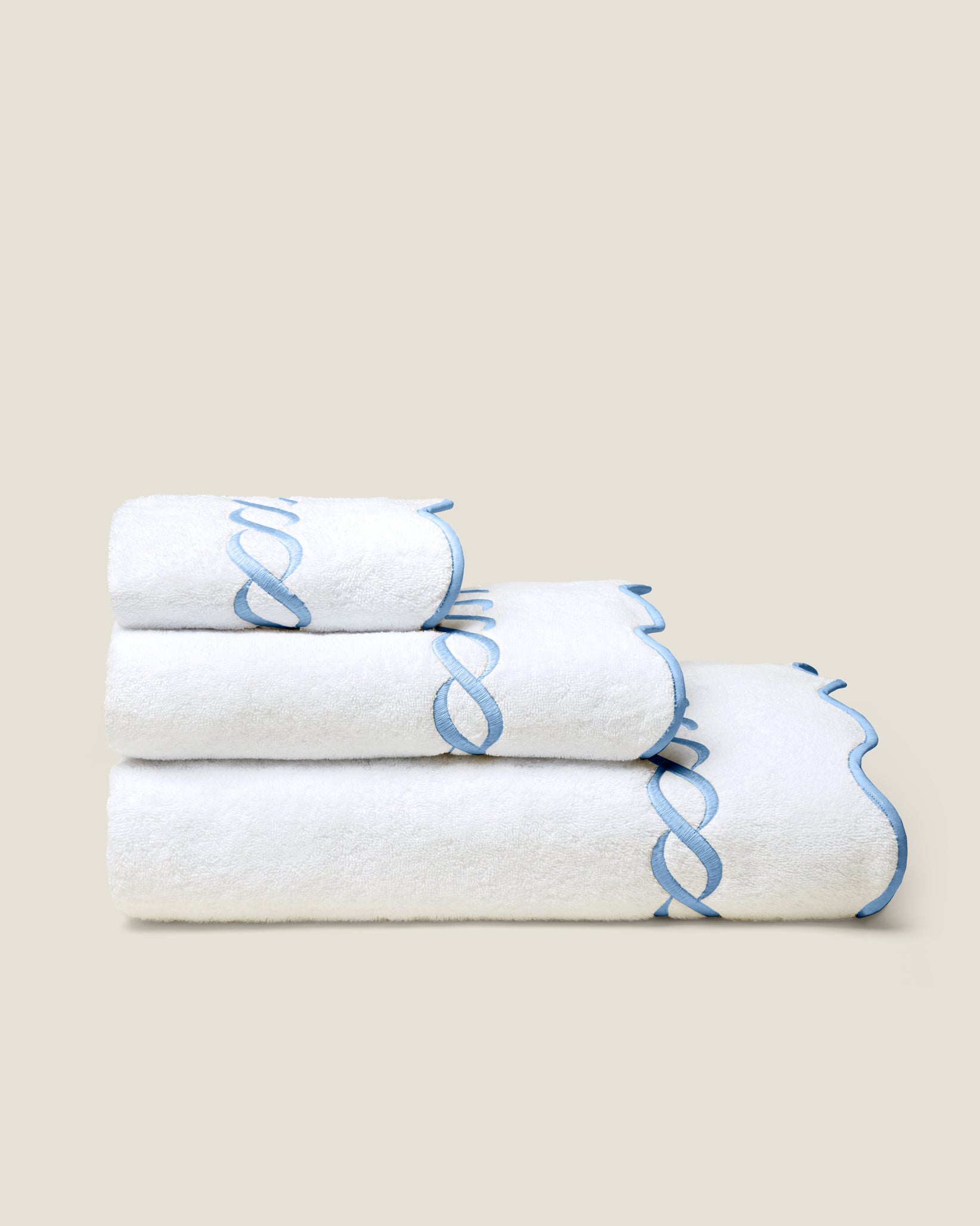 Treccia white/medium blue bath towel stack side view
