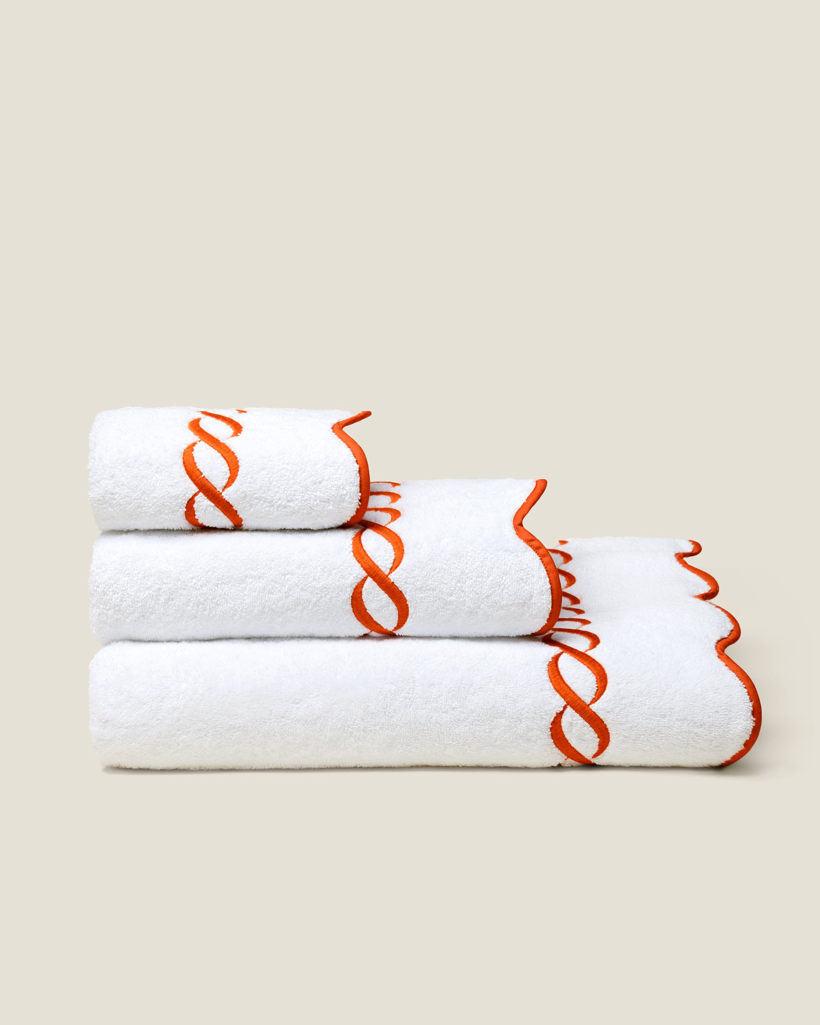 Treccia white/orange bath towel stack side view