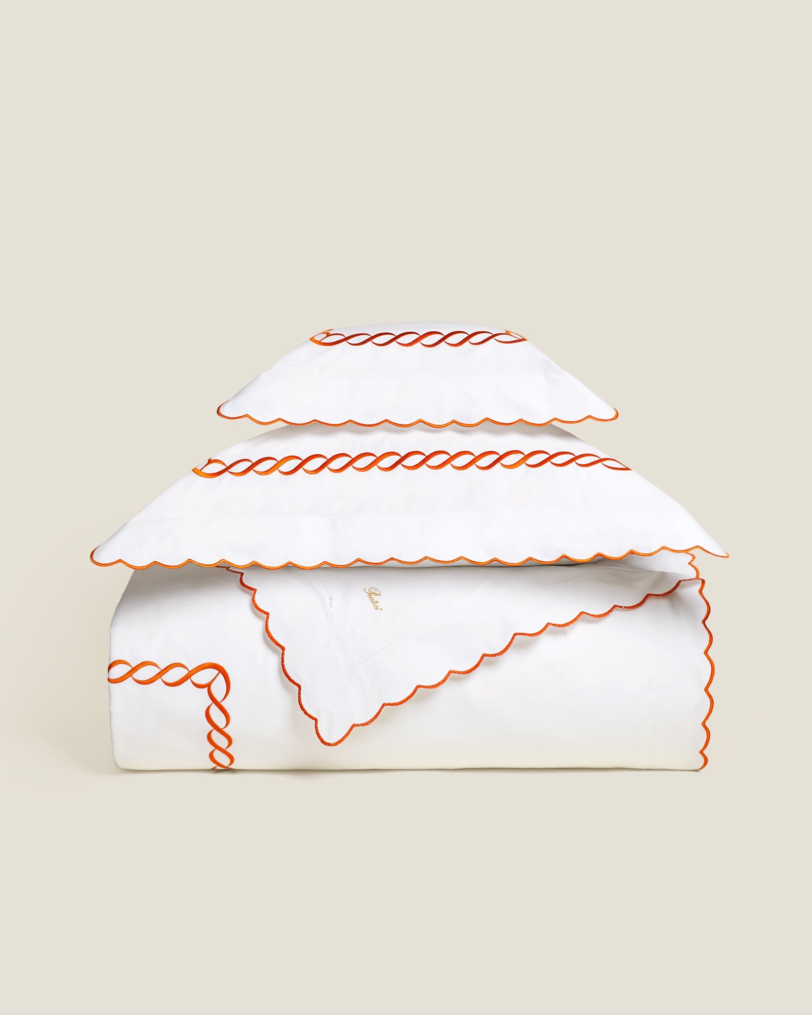 Treccia duvet cover stack in white/orange