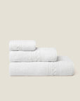 Impero Bath towel, hand towel and washcloth folded and stacked side view
