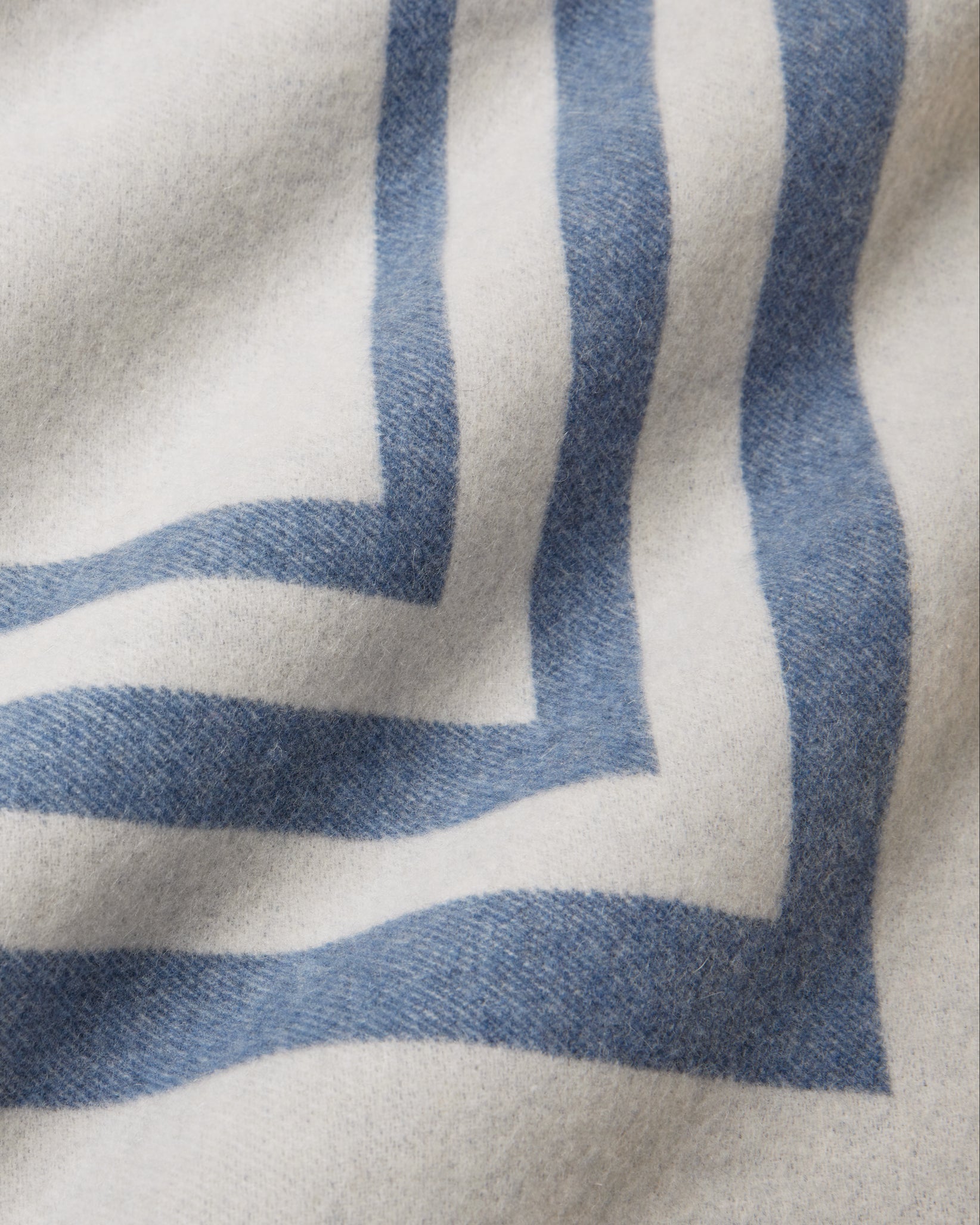 Tre Righe Throw in medium blue close-up