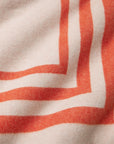 Tre Righe Throw in orange close-up