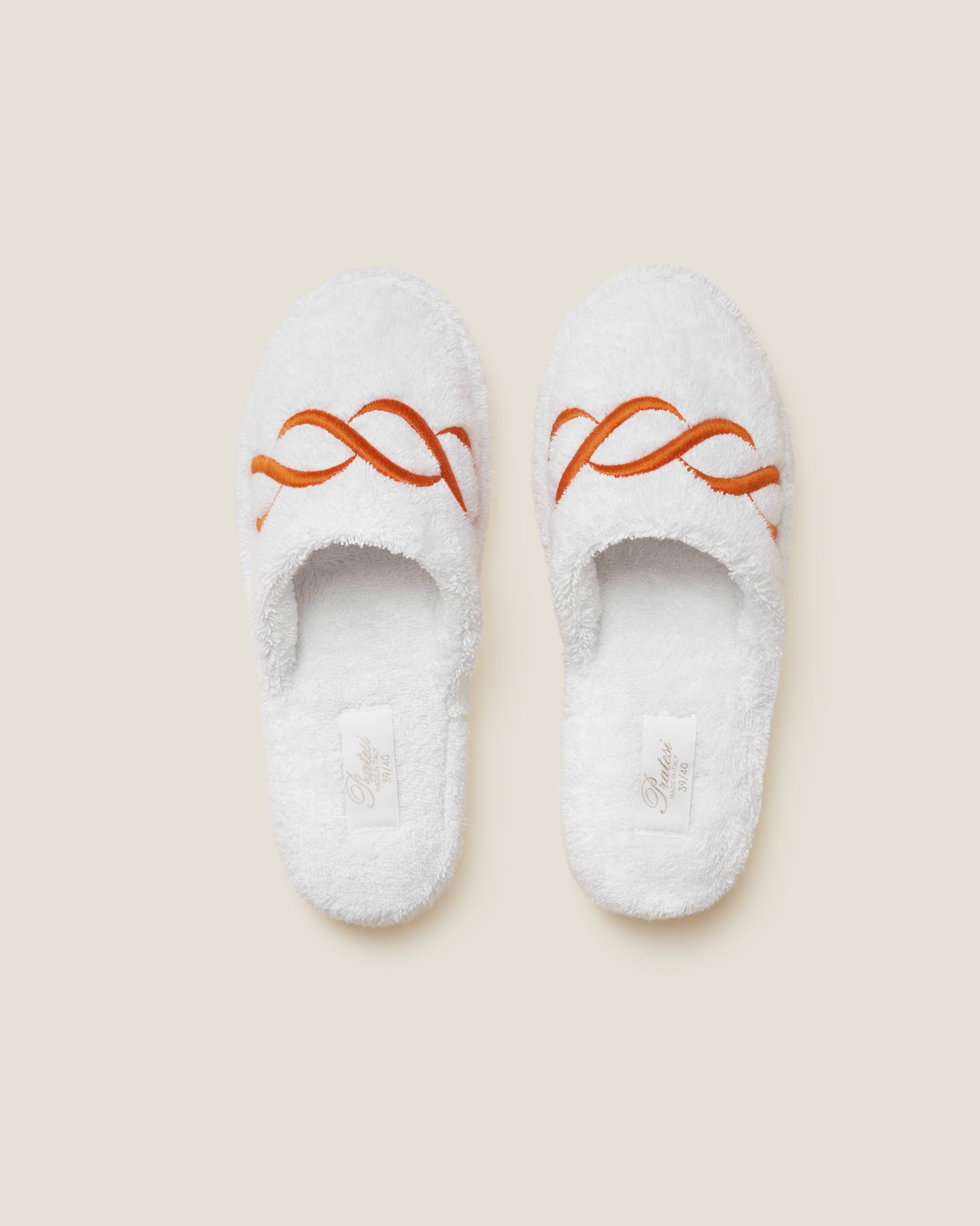 Treccia Slippers in white with orange embroidery