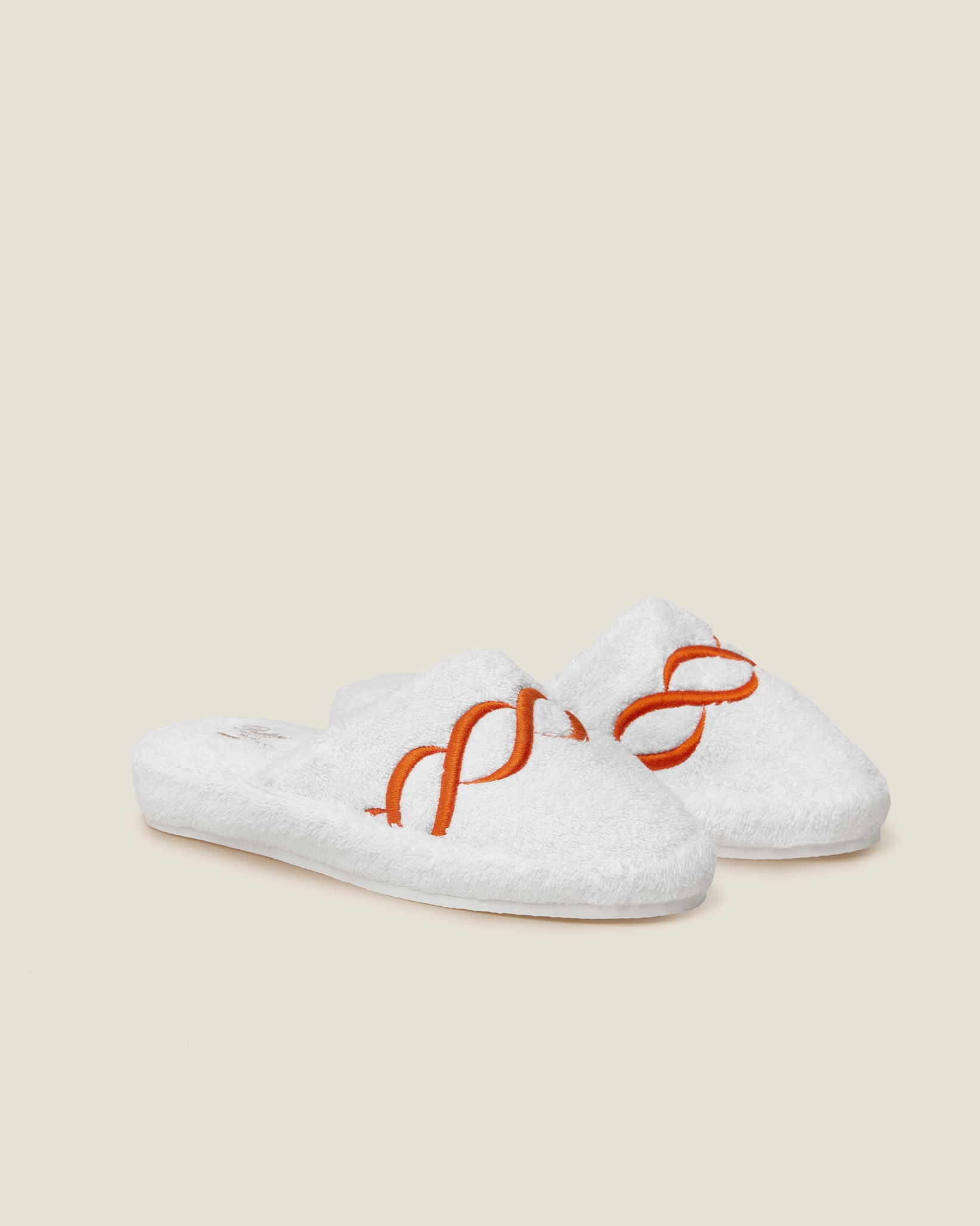 Treccia Slippers in white with orange embroidery