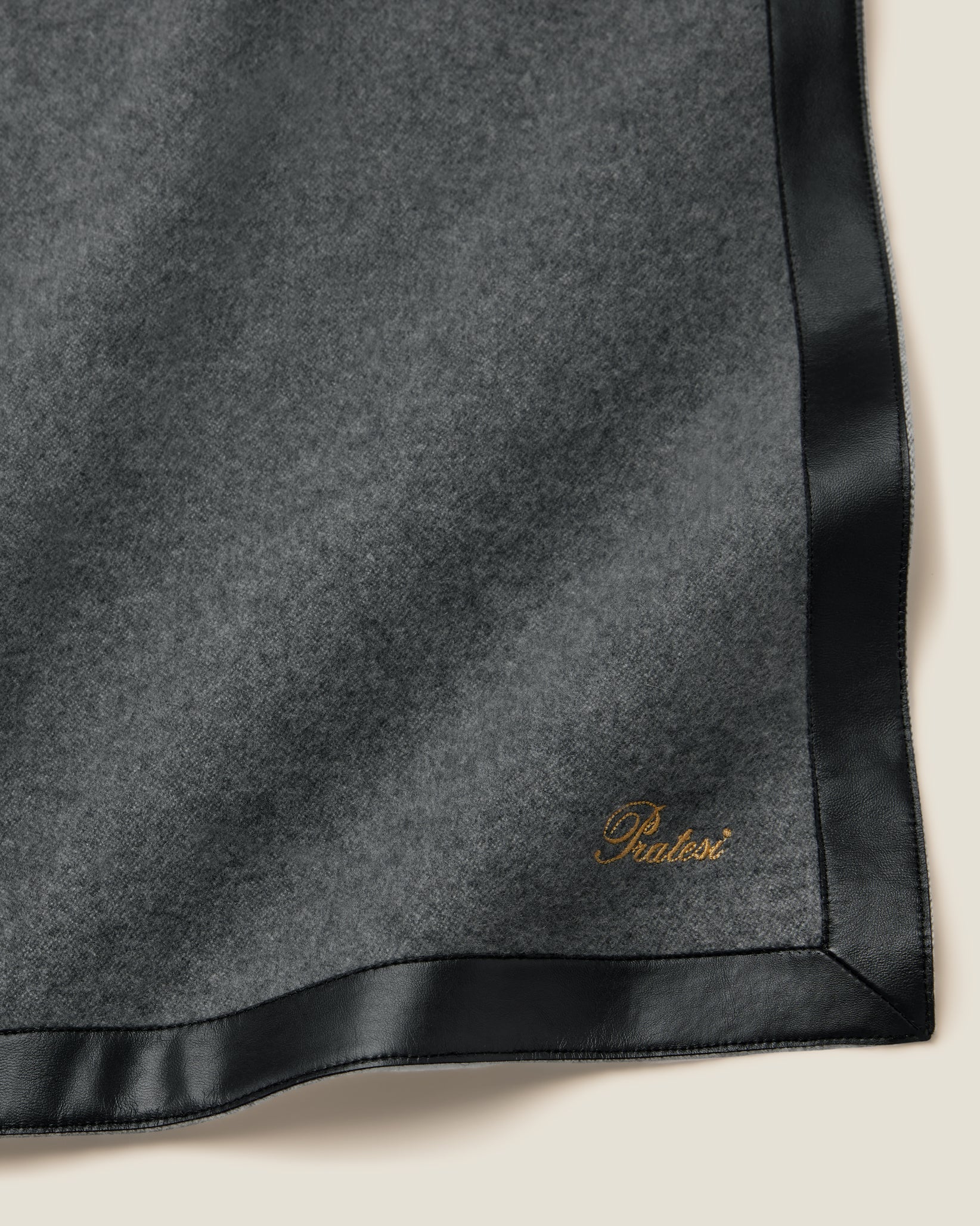 Charcoal/stelring dolomiti throw corner