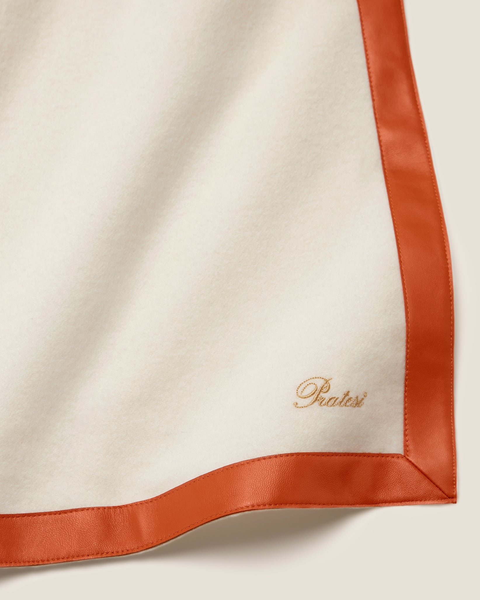 Ivory/Orange dolomiti throw corner