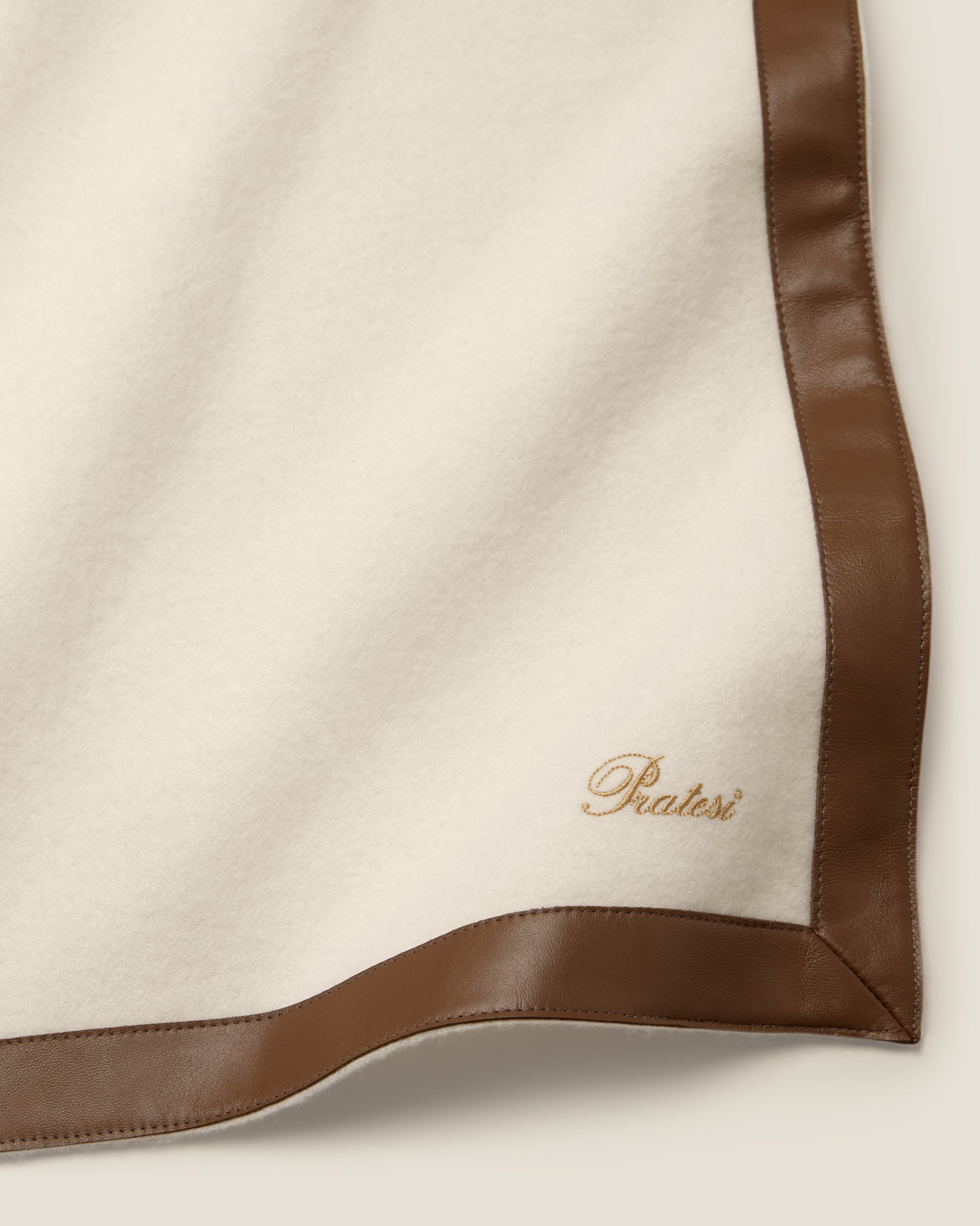Ivory/beige dolomiti throw corner