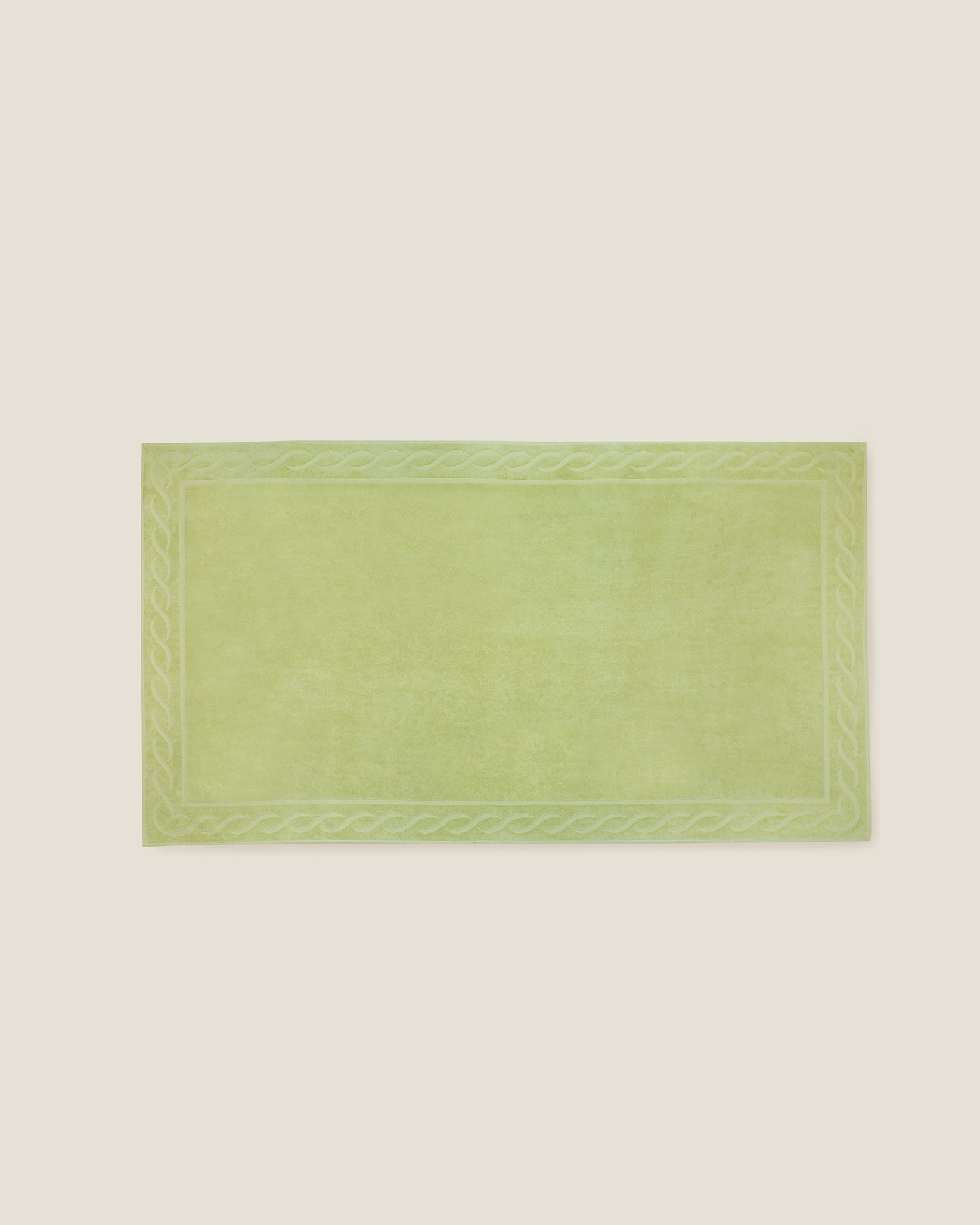 Treccia beach towel in lime