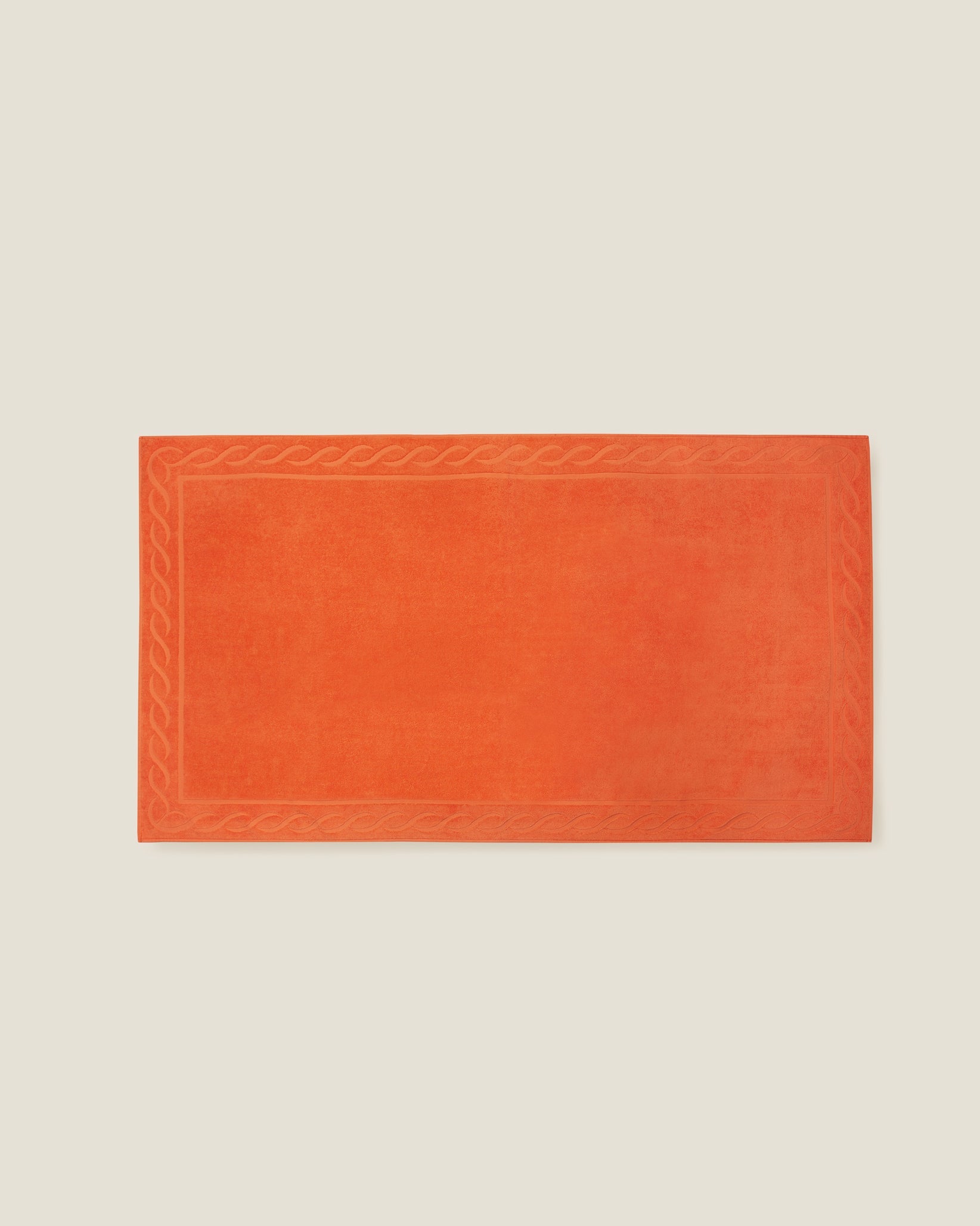 Treccia beach towel in orange