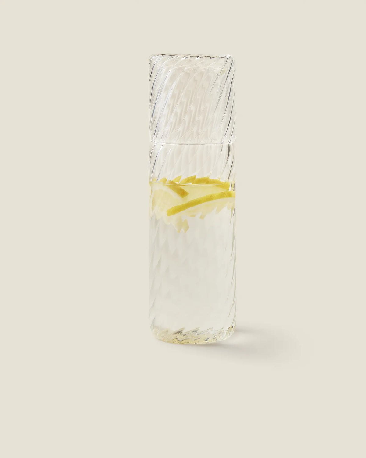 Onda chiara carafe filled with lemon water
