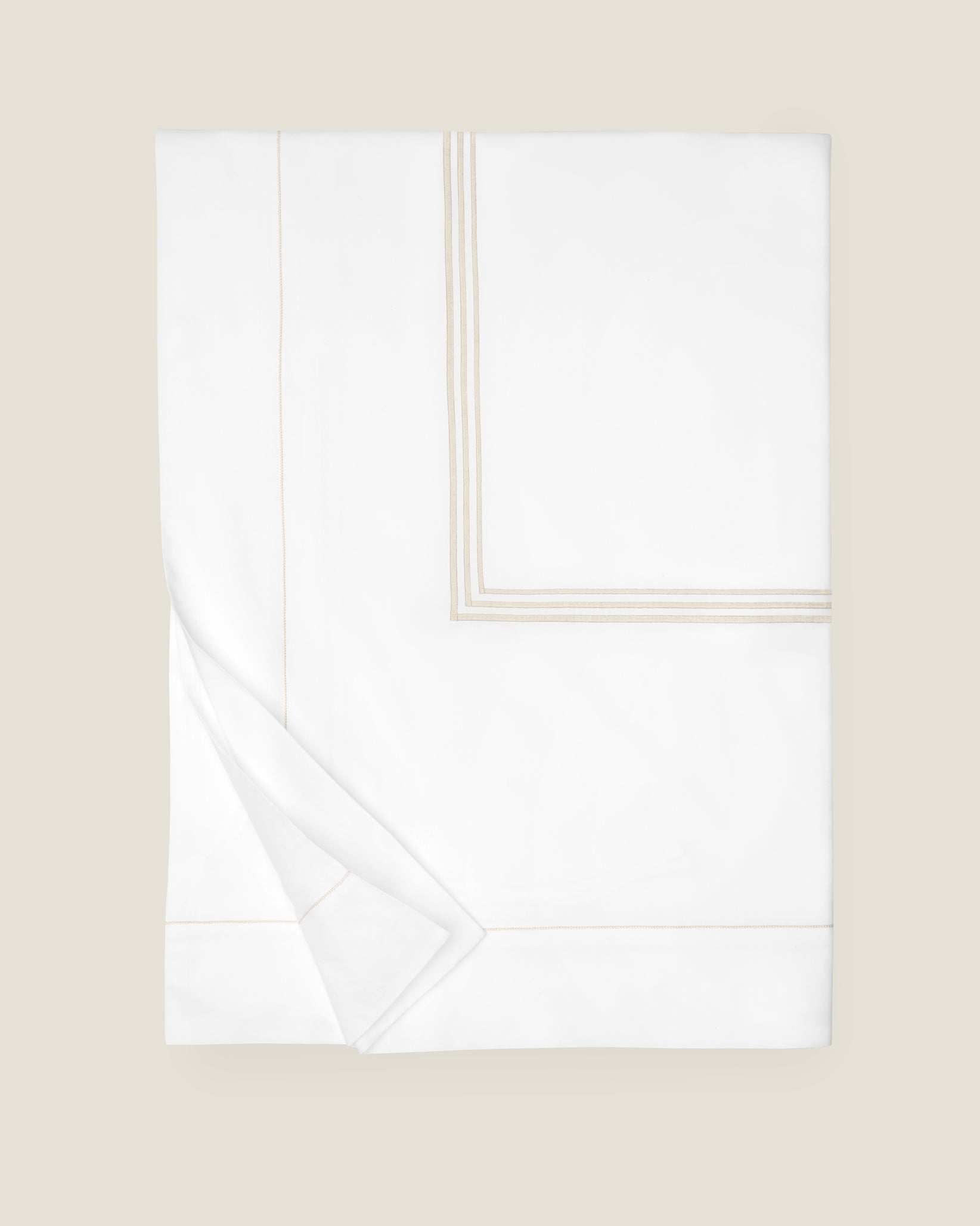 Tre Righe duvet cover in white/sage folded