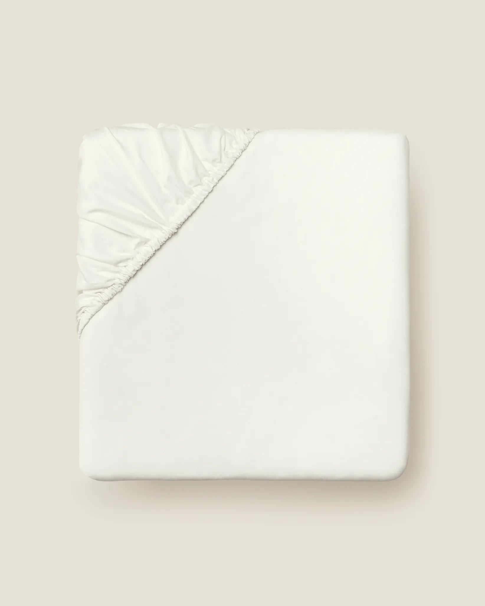 Angel Luxe Ivory fitted sheet folded
