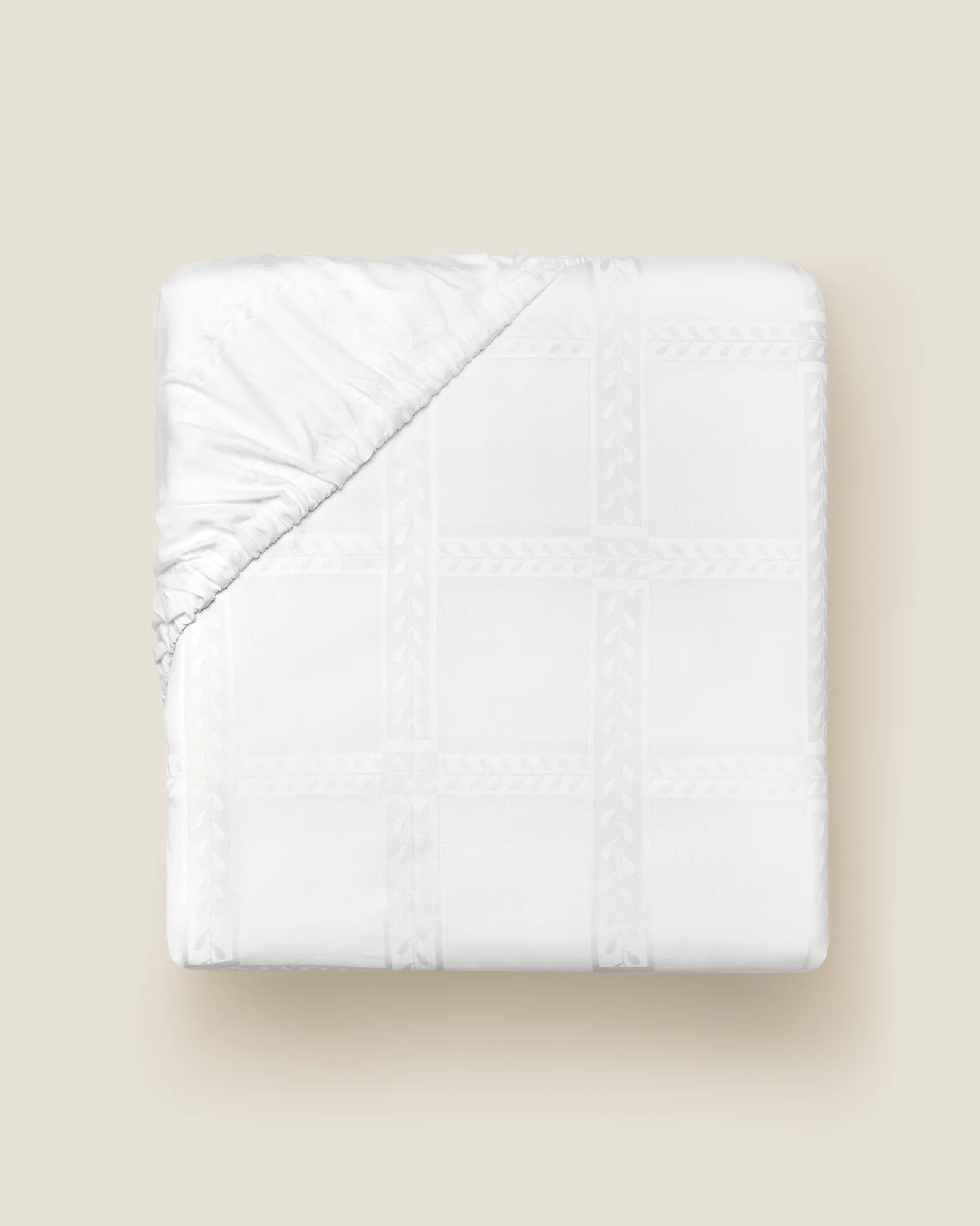 Impero Jacquard bottom fitted sheet in white folded