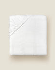 Impero Jacquard bottom fitted sheet in white folded