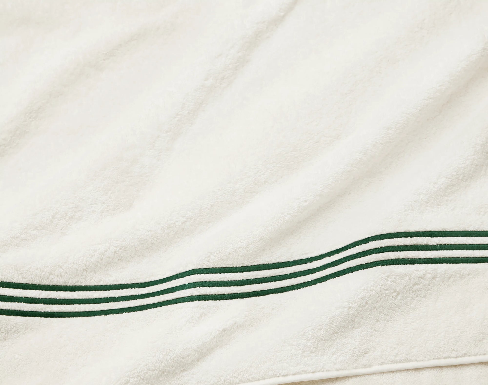 Tre Righe Ivory/emerald bath towels texture