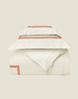 Tre Righe Ivory in Ivory/Orange Duvet cover folded.