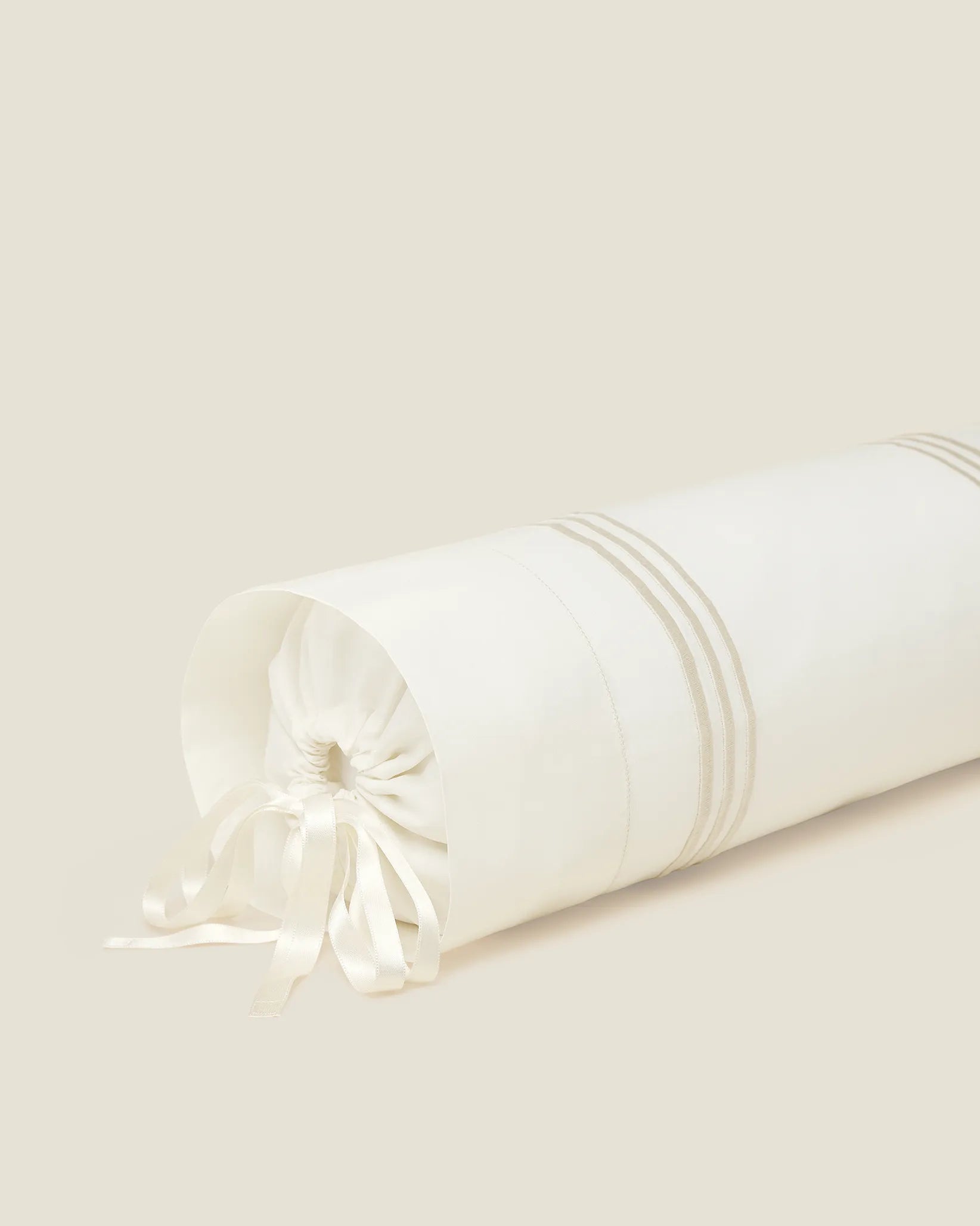 Tre Righe Ivory/beige neckroll sham corner details